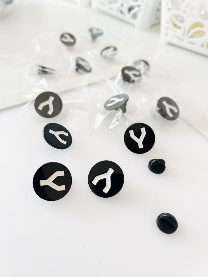Pin metalic Nomonym
